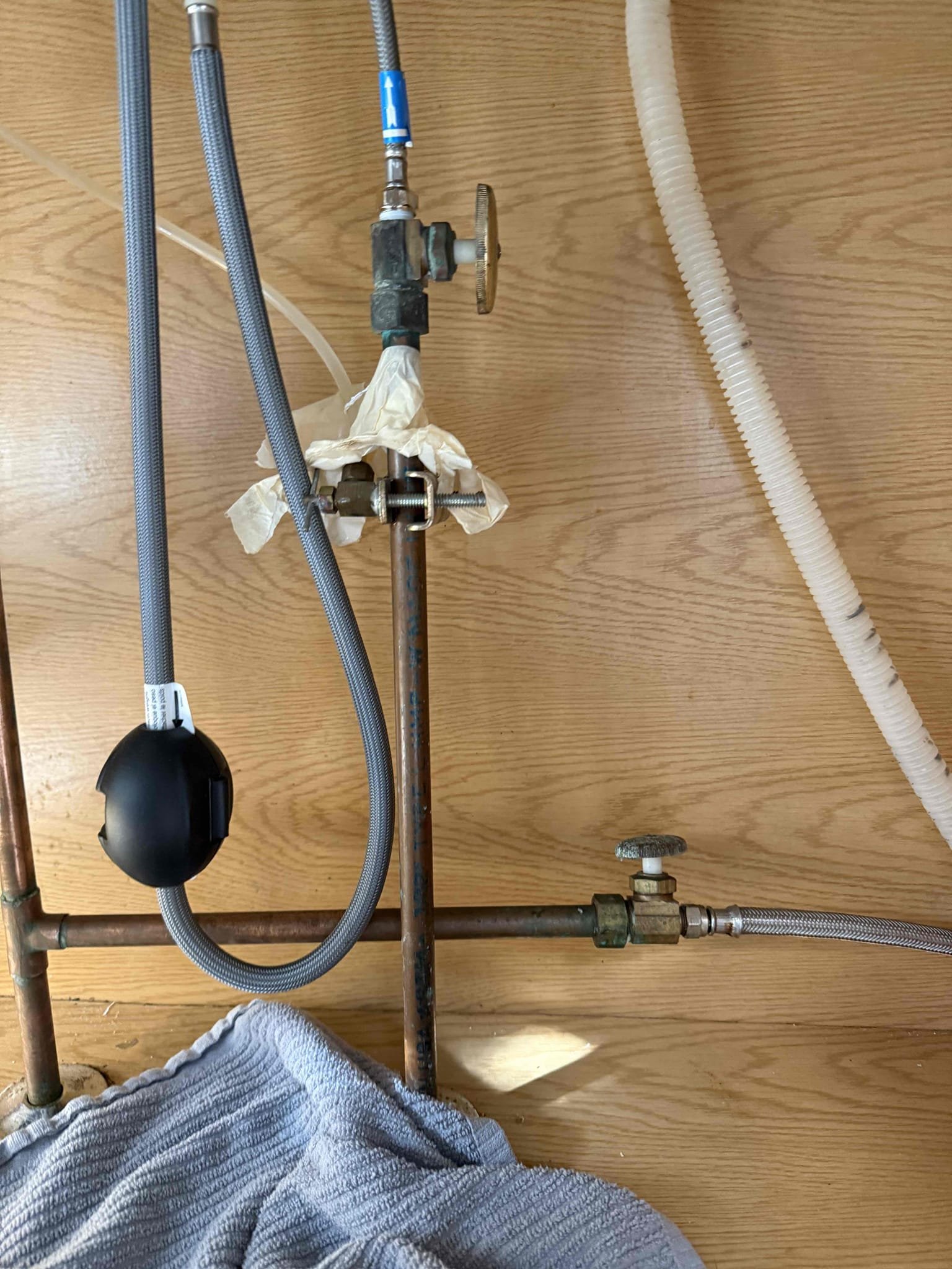 Arrived on site customer stated that they had a leak in the kitchen ceiling , customer also stated that they had a a leak under their kitchen sink. After inspecting, we do not see any water damage. It appears when the hot water is draining from the drain pipe the drain pipe is expanding due to the hot water. Customer also has a saddle valve under their kitchen sink that is leaking. MyGuy plumbing gave customer options to cut out saddle valve and install a new shutoff valve for ice maker line. After all work was completed MyGuy plumbing tested for leaks. At this time no leaks are found everything is working as should.