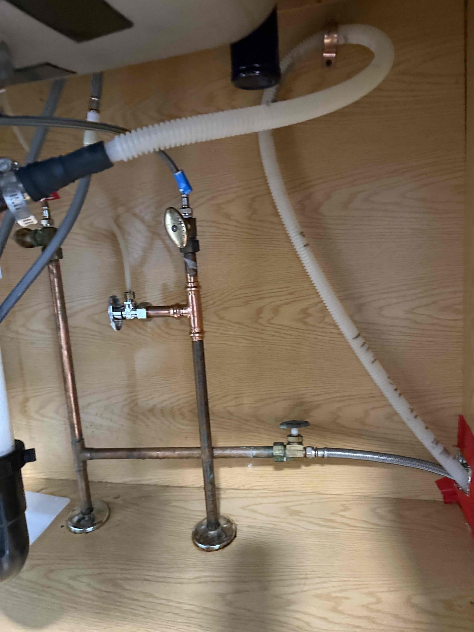 Arrived on site customer stated that they had a leak in the kitchen ceiling , customer also stated that they had a a leak under their kitchen sink. After inspecting, we do not see any water damage. It appears when the hot water is draining from the drain pipe the drain pipe is expanding due to the hot water. Customer also has a saddle valve under their kitchen sink that is leaking. MyGuy plumbing gave customer options to cut out saddle valve and install a new shutoff valve for ice maker line. After all work was completed MyGuy plumbing tested for leaks. At this time no leaks are found everything is working as should.