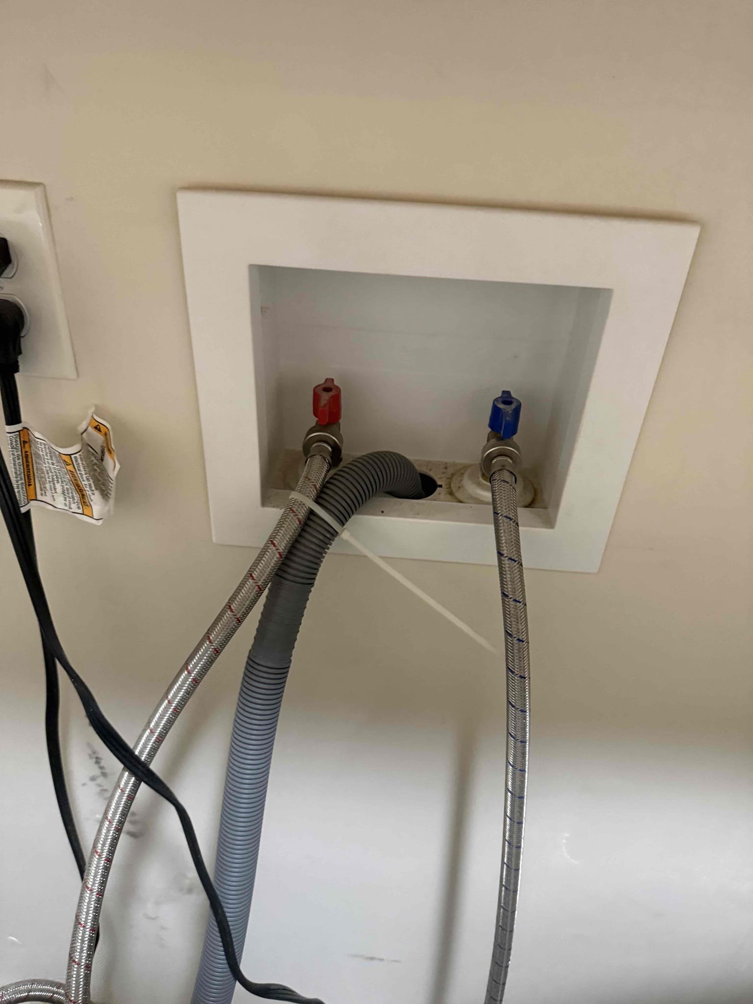 Arrived on site customer stated that they had no hot water in their washing machine. After inspecting we found that the hot and cold lines are labels wrong and when washing machine is calling for hot water, cold water is being introduced and vice versa. MyGuy plumbing gave customer options to rectify issue. MyGuy plumbing swapped water lines for washing machine and everything is working as should, there is no warranty on flipping hot and cold water lines for washing machine 