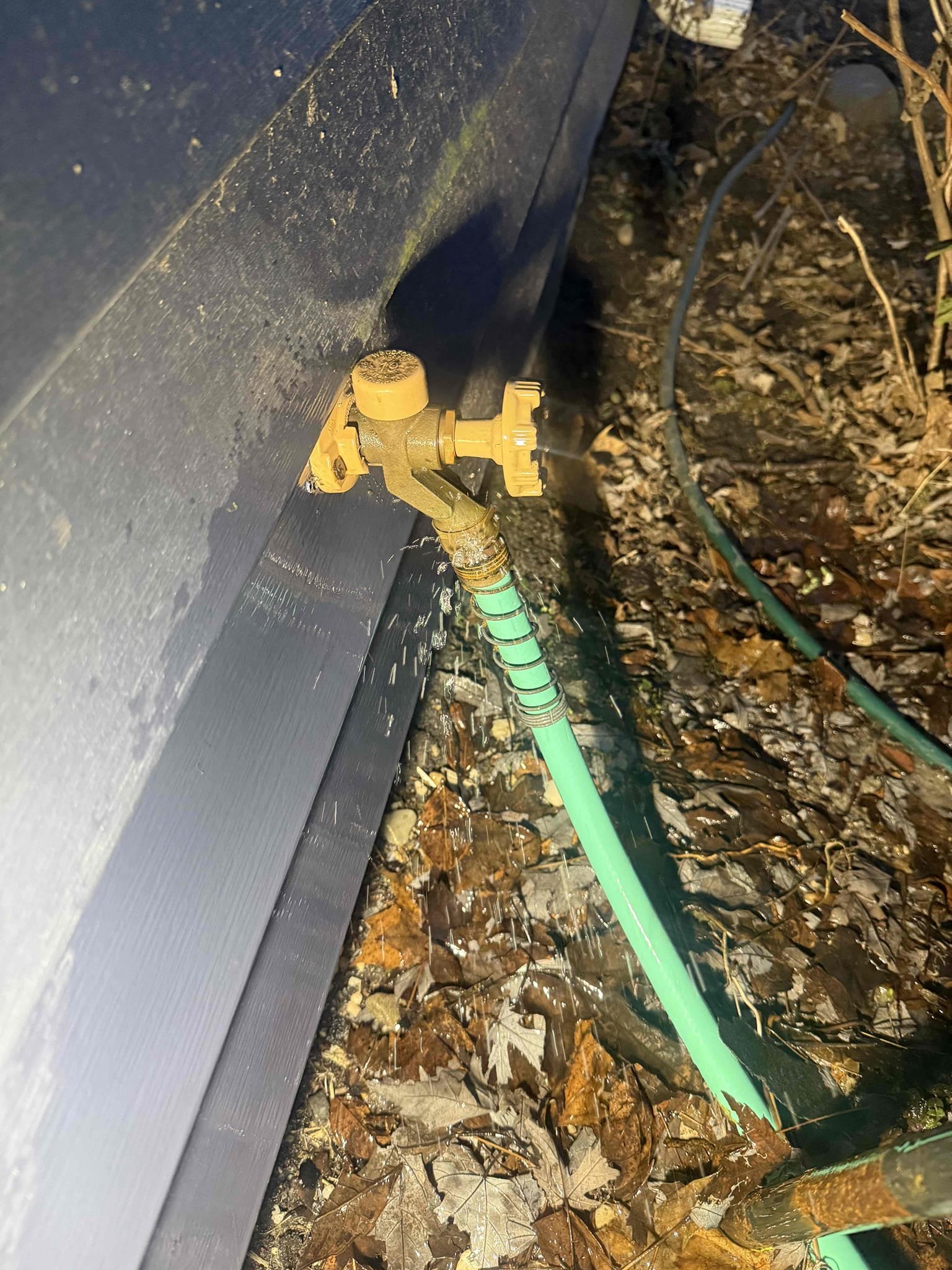 Arrived to home for high water bill. Meter was spinning. Found that hose bib was slightly turned on and water was spraying. Went into crawl to confirm there were no other leaks. There are none at this time. Meter is not spinning. Removed all hoses from bibs