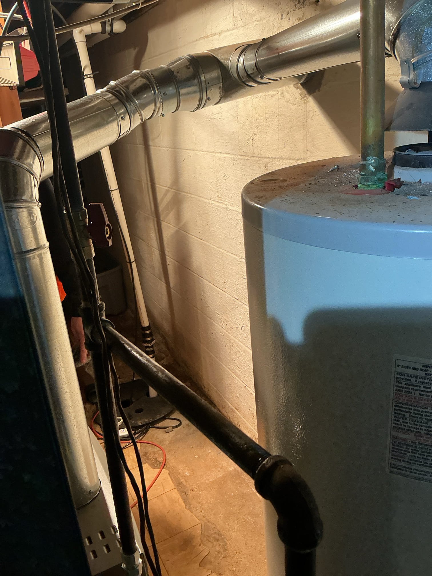 Arrived to the home for a gas leak near the water heater and furnace. Client had called the gas company and the turned off the butterfly valve before the gas cock for both water heater and furnace. Client had three leaks on the gas piping going to the appliances. One on the flex line, another on a flare adapter, and one the butterfly valve. I provided options for repairs and client would like to go through with the work quoted and become a member.

Disassembled all gas piping for water heater and furnace.
Checked threads on piping.
Supplied and installed new gas cock in the place of the butterfly valve.
Supplied and installed new gas flex for water heater.
Secured all connections and bubble tested all the joints on the gas pipe.
There are no leaks at this time.
Relit water heater and started up furnace for client.

*The existing water heater is very old, client is aware and that replacement is highly recommended. Left options for replacement.
*Client is now a member.