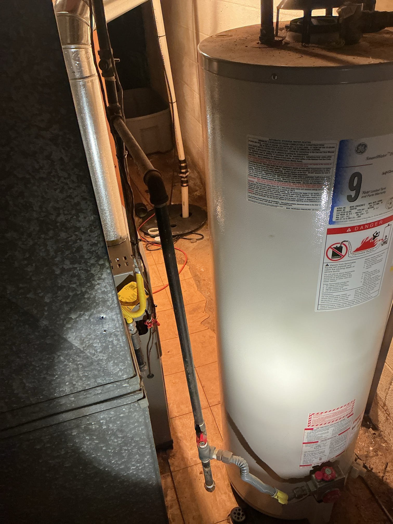 Arrived to the home for a gas leak near the water heater and furnace. Client had called the gas company and the turned off the butterfly valve before the gas cock for both water heater and furnace. Client had three leaks on the gas piping going to the appliances. One on the flex line, another on a flare adapter, and one the butterfly valve. I provided options for repairs and client would like to go through with the work quoted and become a member.

Disassembled all gas piping for water heater and furnace.
Checked threads on piping.
Supplied and installed new gas cock in the place of the butterfly valve.
Supplied and installed new gas flex for water heater.
Secured all connections and bubble tested all the joints on the gas pipe.
There are no leaks at this time.
Relit water heater and started up furnace for client.

*The existing water heater is very old, client is aware and that replacement is highly recommended. Left options for replacement.
*Client is now a member.