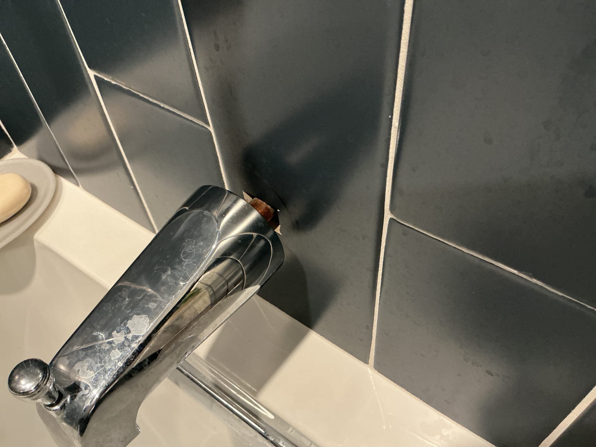 Arrived to the home, customer states the existing tub spout for the shower has copper exposed and is standing proud off the wall. I advised to the client that there is a slight risk that the copper might break in the event of trying to remove it. I provided options and the client would first like to see if it can be replaced without cutting open the wall.

Disconnected and removed existing tub spout from the home.
Cleaned and prepped the piping for the new install.
Supplied and installed new tub spout.
Secured my connections and tested to check for leaks.
There are no leaks at this time.
Caulked spout for client as well.