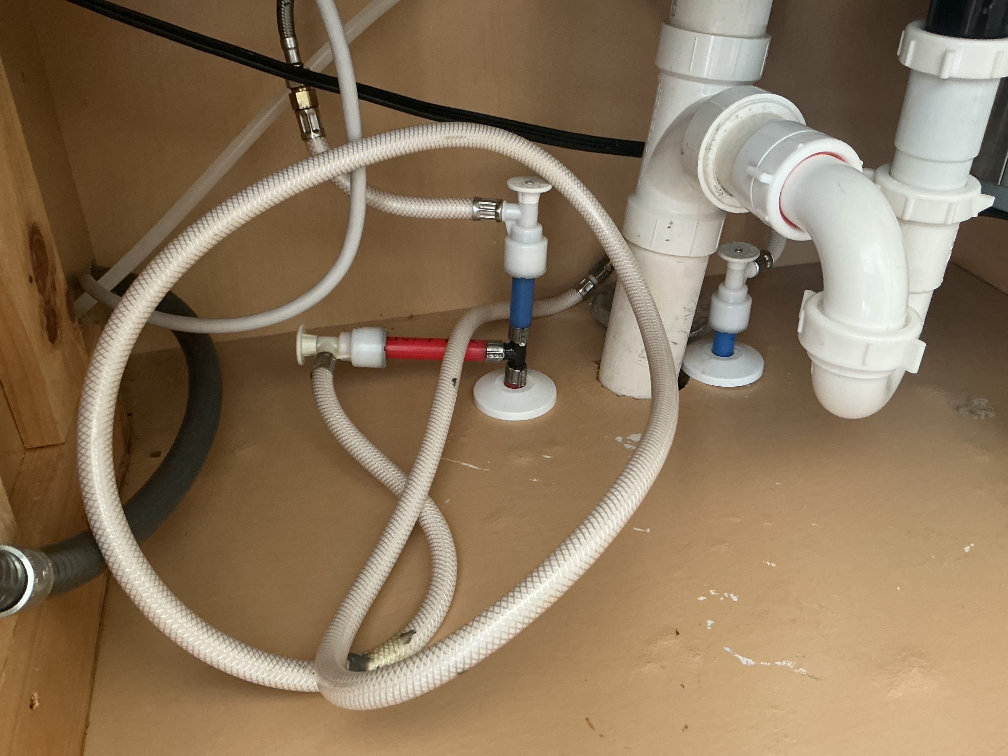 We had recently came out to the home for a mystery leak under the kitchen sink, at the time of that service the technician had tightened something that was loose under the sink. I arrived back to the home for this mystery leak under the sink. After many several minutes of trying to find the leak, I discovered that the sharkbite fitting for the cold side under the sink is leaking from where the push to connect connects. I advised to the client to have me remove all the sharkbites under the kitchen sink to rule out any other potential leaks from the other ones in the future.

Turned off the water to the home.
Drained down the system.
Cut out and removed sharkbite valves from the home.
Supplied and installed new straight stops under the kitchen sink.
Secured my connections and turned the water back on to check for leaks.
5ere are no leaks at this time.