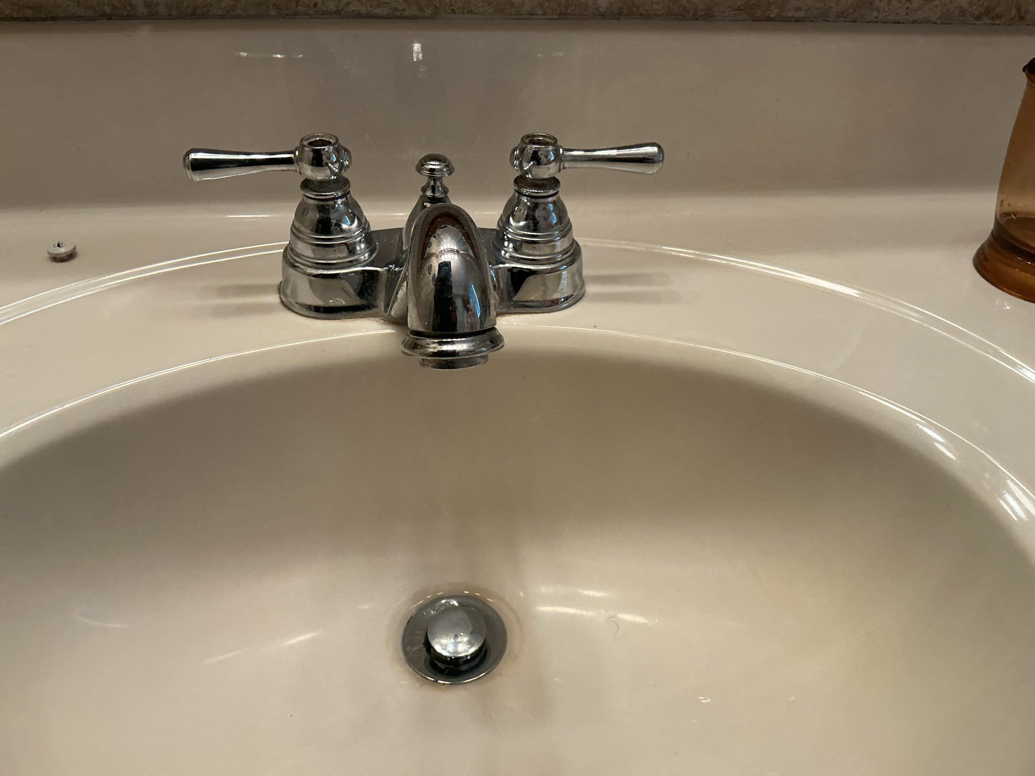 Hardness 5
PH 7.2
Chlorine 1.0 ppm

Arrived to the home, customer states their existing lav faucet has a constant drip and will not stop. I diagnosed this as failing cartridges. Existing faucet was very old and replacement over repair was recommended. Client would like to have a faucet installed by MyGuy Plumbing.

Disconnected and removed existing faucet and pop up assembly.
Cleaned surface of vanity.
Supplied and installed new Moen Two handle lav faucet, new pop up assembly, and supply lines.
Secured all my connections and pressure tested the sink many times to check for leaks.
There are no leaks at this time.