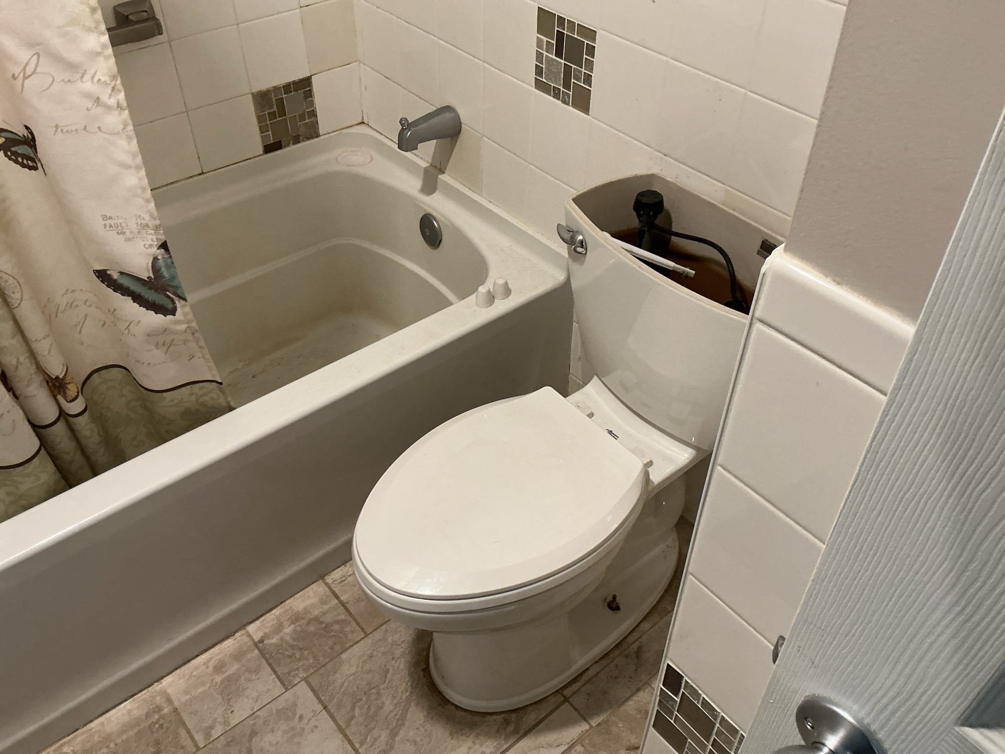 Pulled and disconnected toilet from the home.
Plugged off drain and capped off water line for toilet.
Disconnected shower trim and drain.
Left dollar plug for drain after removal of bathtub.
Cut and capped off water and waste for under the vanity.

*The water lines for the vanity, appear to tee off and go under trailer and rise up to provide water for the shower in the other bathroom. Vanity will needed to be demolished at the time of removal, homeowner is aware.