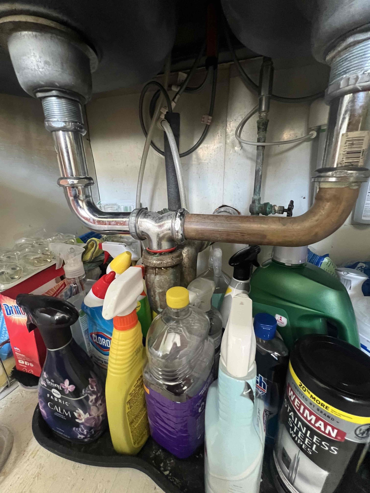 Arrived on site for $89 to clear your line special. Upon arrival client stated his entire home was not backed up but some drains were slow. Upon inspection in the basement there multiple things wrong and leaking in the basement. Clients trap for the shower drain was leaking as it has an hole in it after client went to grab it and a few galvanized fittings underneath it were leaking as well. The washing machine does not have a trap and drains through a plastic tube going across the basement into the main. Same thing is done for the dishwasher. There is a small section of galvanized water line that I left estimates for to replace and his main water valve is very old as well. There is also an accordion style tailpiece under the lav sink that ties into galvanized piping that is also leaking behind the wall. Left options to either replace what’s leaking or to bring everything up to code that I saw wrong in the basement, bathroom , and kitchen sink. Client stated he was not made aware of the