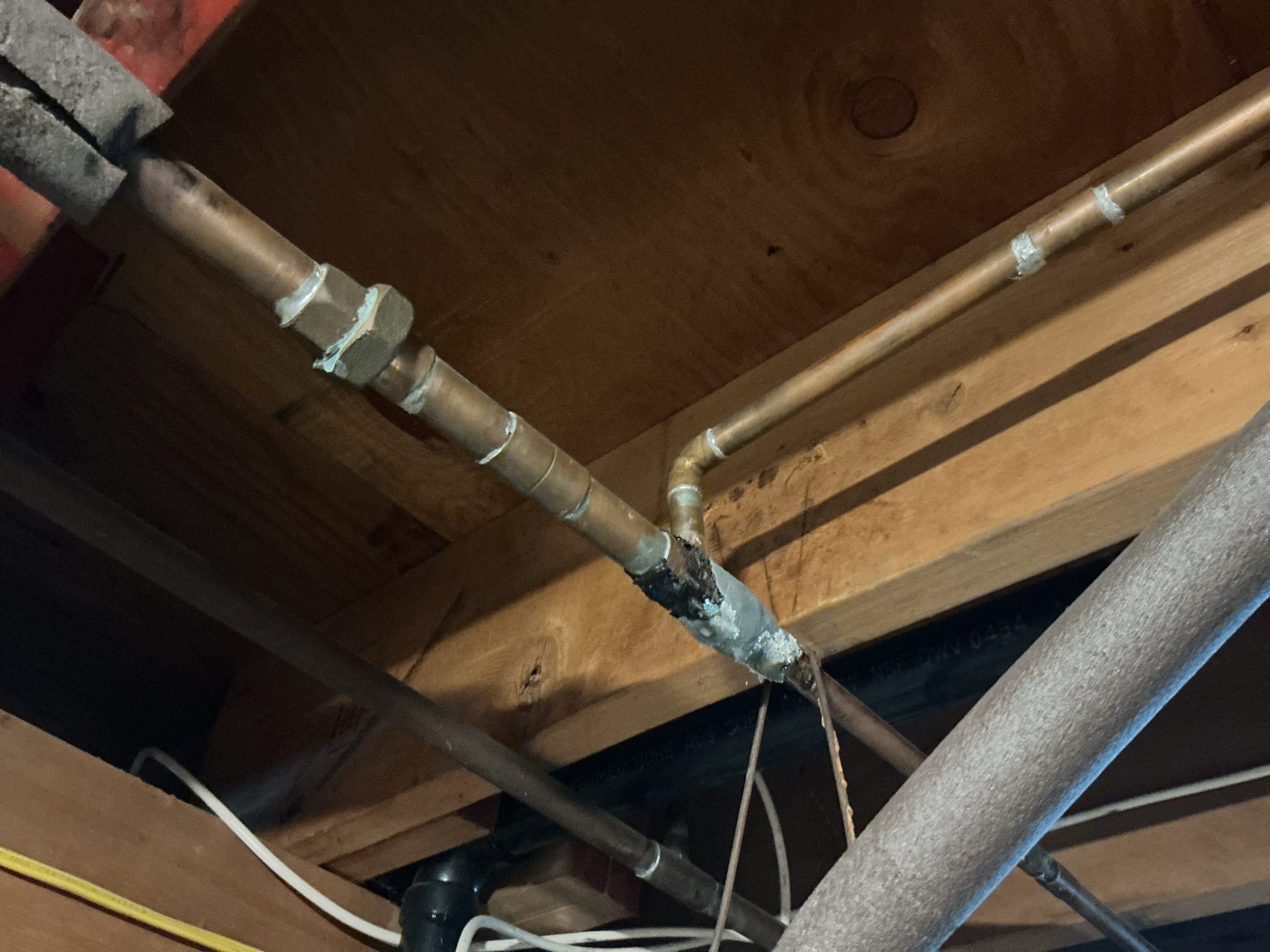 Arrived to the home, client states that they have a leaking copper pipe in the basement that they have tried patching over the years but is leaking worse. There are also saddle tap valve in the basement for the humidifier. I provided options for the client to fix everything and they will only like to have the copper pipe repaired.

Turned off the water to the home.
Drained down the system.
Cut out and removed existing copper pipe from the home.
Supplied and installed new copper pipe and fittings.
Secured lol my connections and turned the water on to check for leaks.
There are no leaks at this time.
Strapped up piping in the basement as a one time curtesy.