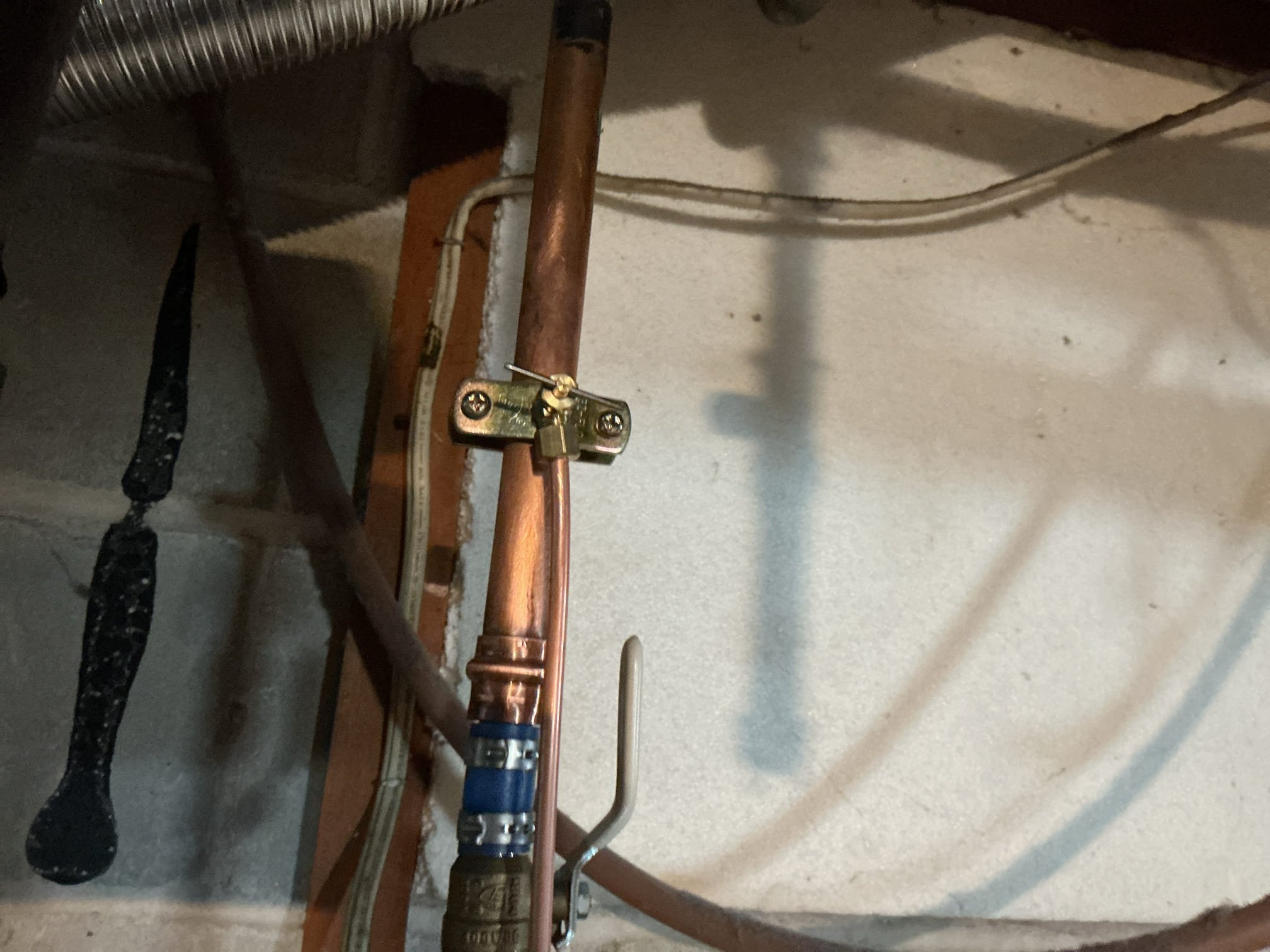 Arrived to the home, client states that they have a leaking copper pipe in the basement that they have tried patching over the years but is leaking worse. There are also saddle tap valve in the basement for the humidifier. I provided options for the client to fix everything and they will only like to have the copper pipe repaired.

Turned off the water to the home.
Drained down the system.
Cut out and removed existing copper pipe from the home.
Supplied and installed new copper pipe and fittings.
Secured lol my connections and turned the water on to check for leaks.
There are no leaks at this time.
Strapped up piping in the basement as a one time curtesy.