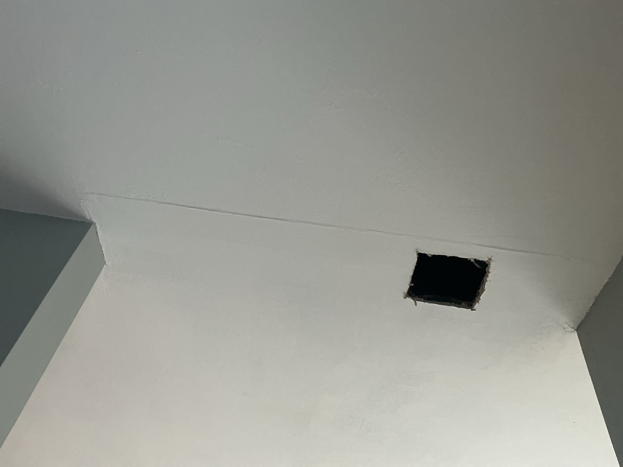 Arrived to the home for a mystery leak somewhere from the upstairs laundry room. Client has had multiple companies out including roofers, plumbers, and dryer vent specialists to try and find the leak. Client had cut many holes in the upstairs bedroom and a small hole on the first floor to fine to leak. I was able to see the copper risers for the washer box from the bedroom and they were all dry. I advised to the client to let me first cut a hole below the riser to see if there are any other leaks. After cutting the hole I discovered the hot side riser was very corroded while the cold was fine. I asked the client if they have had any work done in the bedroom recently. They advised me that they had the flooring done about 4years ago. I then let the client know to let me cut and removed the corroded riser to see if there is a pinhole or anything of the sort. 

Turned off water to the home.
Drained down the system.
Cut out and removed corroded pipe.
Discovered that a finish nail had penetr