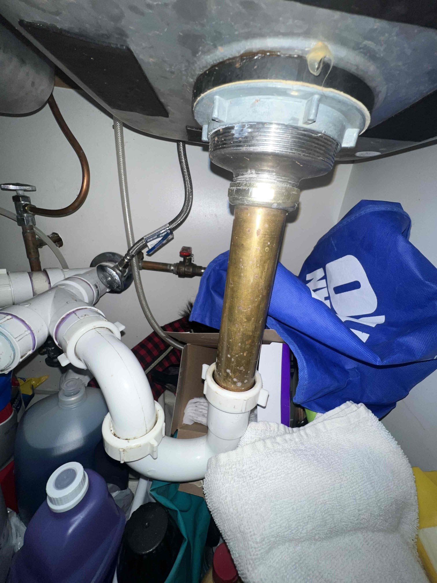 Arrived on site to perform plumbing inspection. Upon inpection we found 2 leaking shutoff valves in the home. There is one leaking valve for the dishwasher and client has a brass dishwasher tailpiece I recommend to get replaced. There is also a leaking valve on the hot side in the hallway bath under the lav sink. Client has a tankless water heater that has not been flushed yet. Today we flushed the tankless water heater.