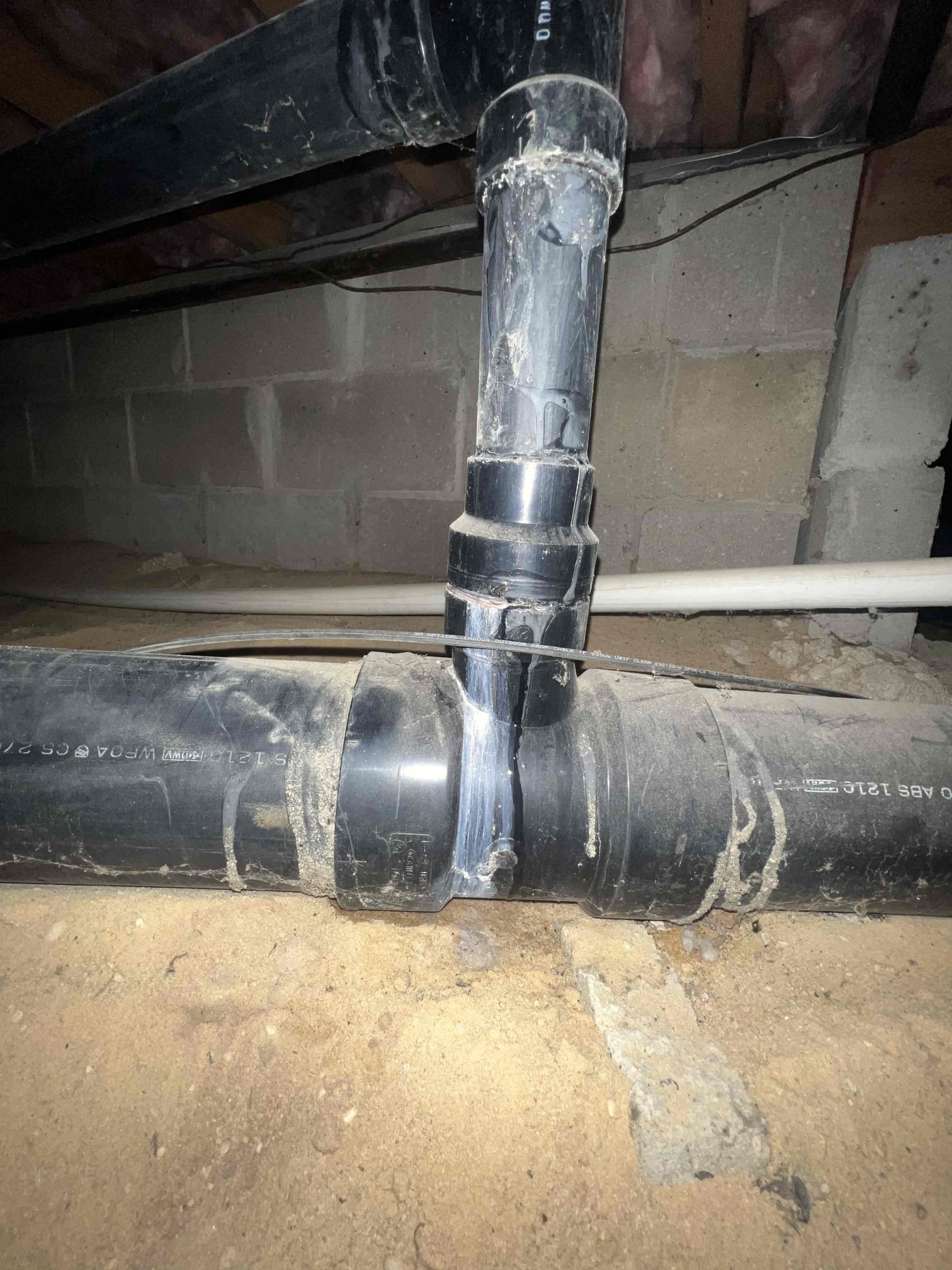 Arrived on site client stated they had a leak at the base of their toilet. When going into the crawlspace to make sure there was no water damage I noticed there was a leak on two different spot on the main. One being for the kitchen where it ties into the main and the other being on the main stack anytime water was being used in the bathroom that wye fitting would leak. Client would like to move forward with the work and we will return another day to perform work.