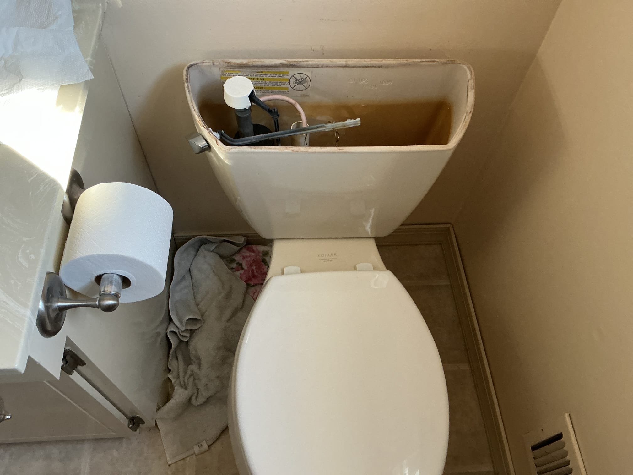 Disconnected and removed existing toilet from the home.
Cleaned surface of the floor.
Supplied and installed new wax seal, Johnny bolts, and supply line.
Supplied and install new American Standard Cadet Pro toilet.
Secured toilet to the existing flange.
Secured all my connections and turned the water on.
Flushed toilet numerous times to check for leaks.
There are no leaks at this time.

*Offered discount for toilet due to the water main being located directly behind the water heater with no access to it. There is a meter pit outside but that is not accessible at this time either due to snow and ice. I was unable to replace the shut off valve for the toilet. I will leave an estimate to to cut a hole on the other side of the water heater and installed a new shut off valve for the home with an access panel.

*The apron of the old toilet does not match the new apron and whatever was used to caulk the old toilet had stained the flooring. Client is aware and understands.