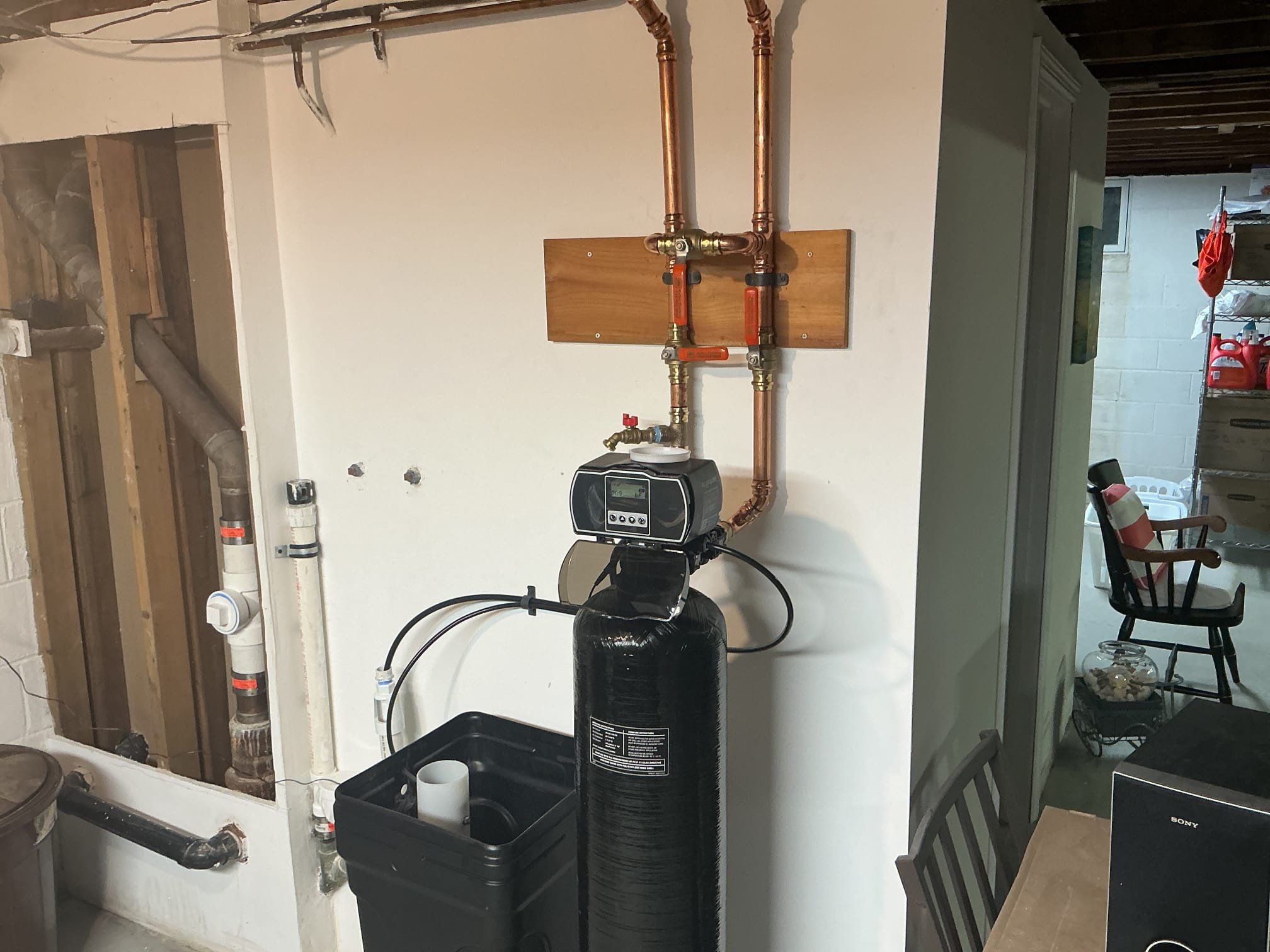 Installed a customer supplied whole home water softener.
Turned off the water and drained the system.
Ran pex piping to the proper location of the softener.
Supplied and installed copper pipe, fittings, shut off valves, and bypass.
Secured all my connections and followed the manufacturers specifications.
Started up system and checked for leaks.
There are no leaks at this time.