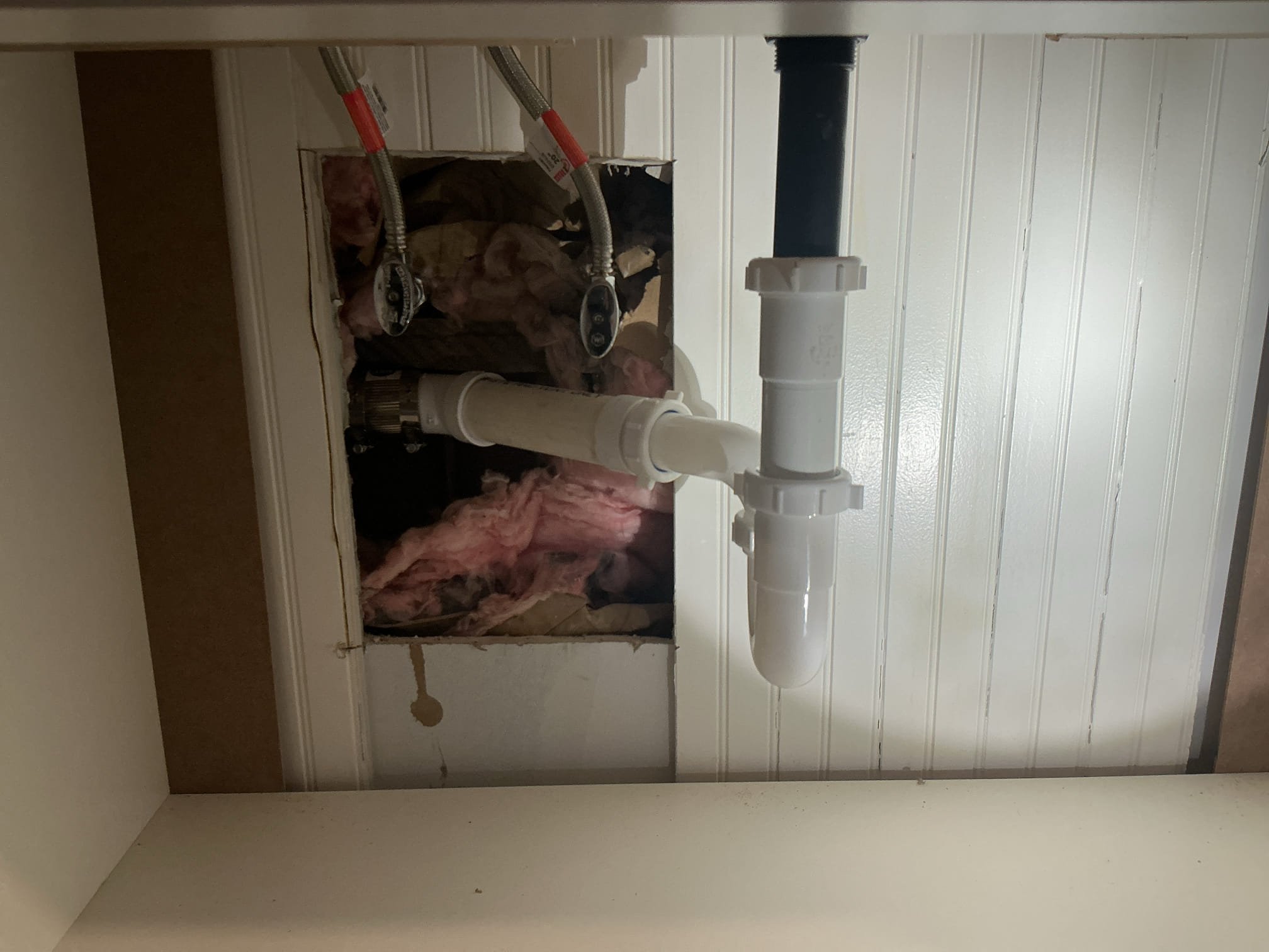 Client is completely aware that the wall will more than likely become damaged due to the existing vanity is held in place with construction adhesive. I am having the client sign off that they are okay with the demo.


-disconn3 Ted and removed existing vanity 
- supplied and installed new shut off valves, supply lines and new drainage 
- secured new vanity to the wall 
- added sealant for the top and secured connections
- made up drain and pressure tested drain for leaks
** are no leaks at this time 
- caulked vanity top as well 


* client is aware of my guy not being aware of any damages done to the wall 
* previous vanity was sealed together using liquid nail or construction adhesive.
* customer gave permission to remove vanity even if it meant causing damage to back wall
* parts and labor warranty only on rebuild underneath sink, cannot warranty customer supplied products, faucet and vanity.