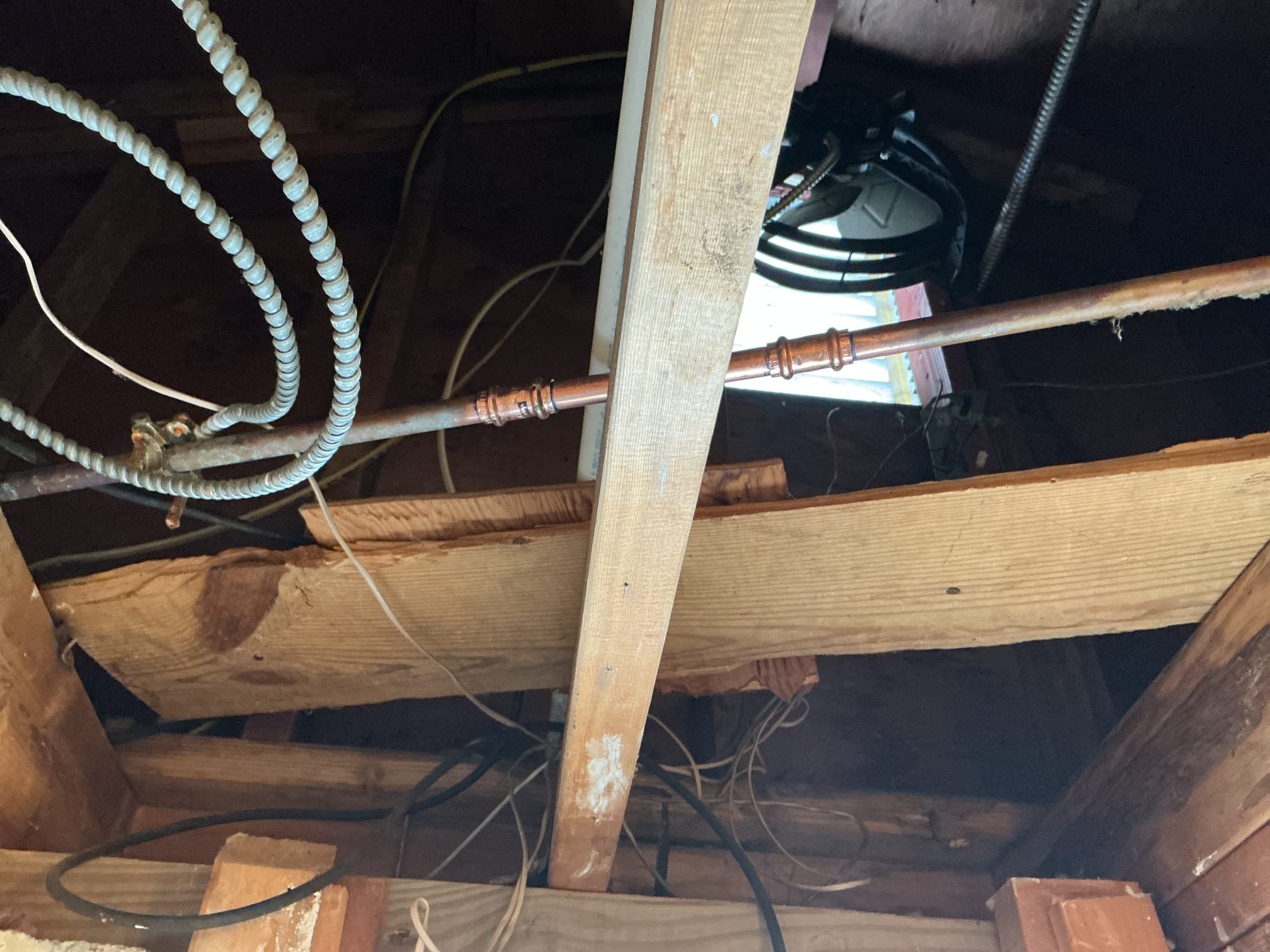 Arrived to the home, client stated they have a freeze break in the attic that ultimately flooded the first floor bathroom. Ceiling is already taken down and I can visually see the leak. I provided options for repair and client would like to just repair the break to get the water back on to the home.

Cleaned surface of the piping.
Cut out and removed freeze break.
Supplied and installed new copper pipe and fittings.
Secured my connections and turned the water back on to the home to check for leaks.
There are no leaks at this time.
Purged the system of air as well.

*Client is aware that MyGuy Plumbing can not provide a warranty if another freeze break were to occur.