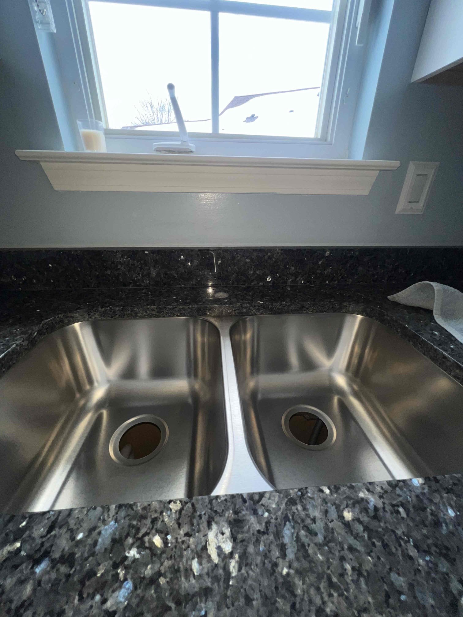 Arrived on  site client wanted us to hookup her kitchen faucet and all drainage underneath the sink. Upon inspection client did not have a separate valve for the icemaker so we offered to add a new valve for that but client did not want to move forward with that due to cost. Today we installed a customer supplied faucet as a courtesy, 2 new basket strainers, and all the drainage underneath the kitchen sink. When done we tested for our work by running hot water and filling the sink up. There are no leaks at this time. 