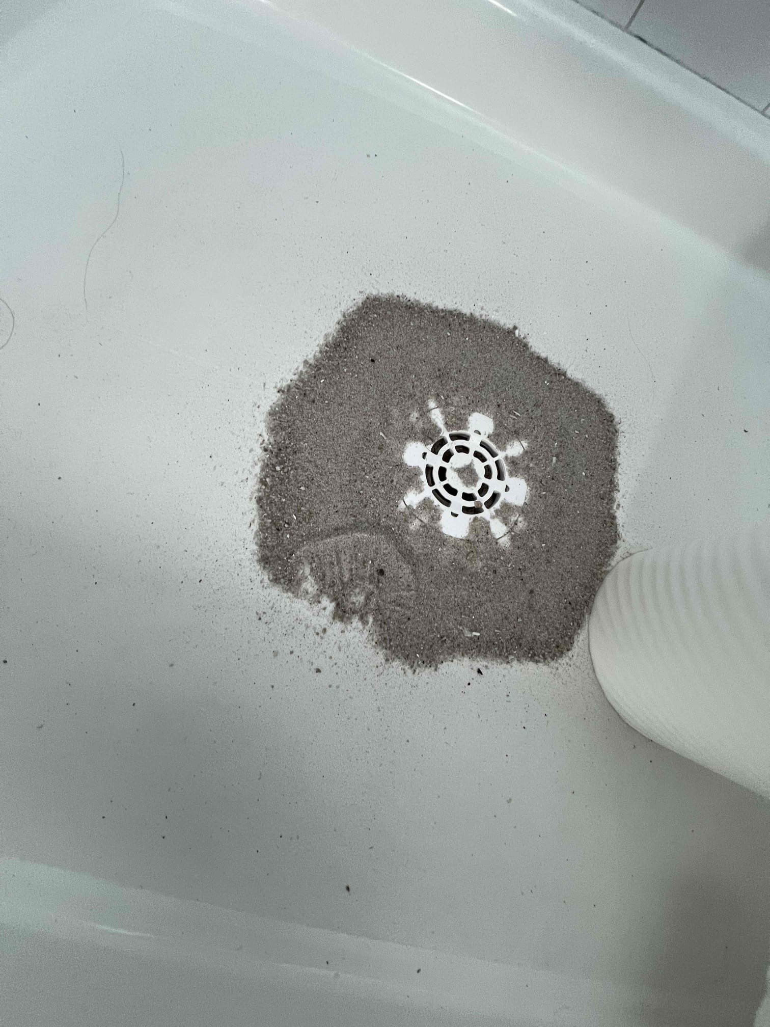 Main line clog could potentially be frozen, collapsed pipe or both. Main sewer appears to be less than 3 ft underground which has a high risk of it freezing. There is also sand coming out of the shower upstairs which is what my cable could have been getting caught on.