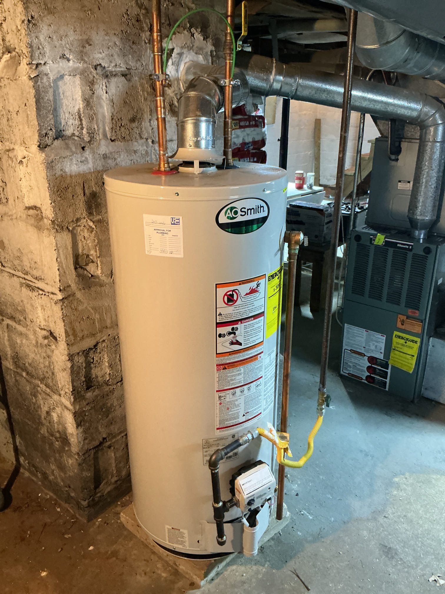 Arrived to the home, client would like an estimate for replacement of there existing 40 gallon natural draft water heater. There is nothing wrong with the water heater, client is just looking to be proactive. While going over the scope of the work, the client explained that they have two leaks in the basement, one is the existing single handle washing machine valve, and a leaking brass plug that is going to nothing. I provided options and client would like to fix the active leaks and get a quote for water heater replacement.

Turned off the water to the home.
Drained down the system.
Disconnected and removed existing washing machine valve.
Supplied and installed new brand new boiler drain valves for the washer both on hot and cold side.
Secured my connections.

Cut out and removed leaking brass plug.
Prepped piping for new install.
Supplied and installed new copper pipes and fittings.
Secured those connections.
Turned the water back onto the home to check for leaks.
There are no leaks 