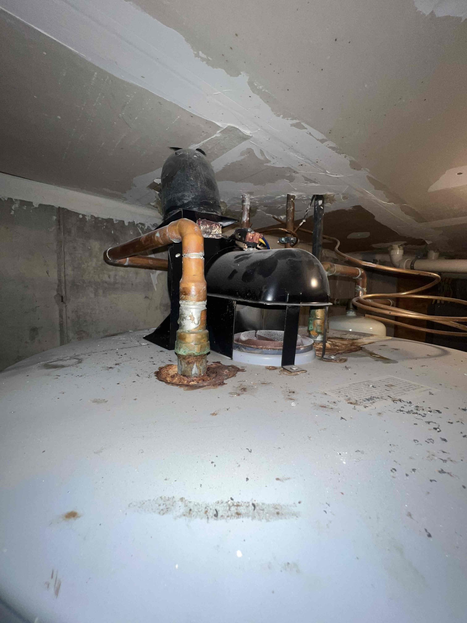 Arrived on site client stated they had a leak under the kitchen sink. Upon inspection the leak appears to be coming from multiple joints under the kitchen sink. Basket strainer also appears to be old as well. When checking out the water heater there were old water stains and it is 23 years old. Left prices to replace water heater and fix the drainage under the kitchen sink.