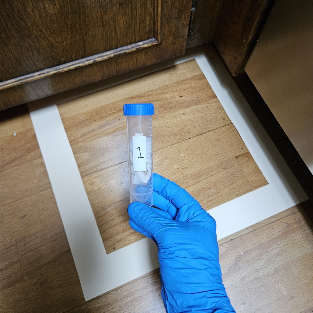 Testing for levels of asbestos dust in a residence that was improperly abated! Be sure to check your contractors credentials before hiring.