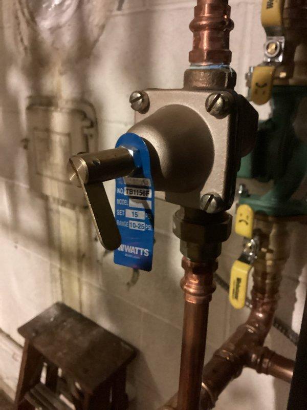 Responded to service call for a Combi boiler with no hot water and no heat. Inspection revealed pressure regulation issues with the system. Adjusted the pressure regulator valve and verified system pressure readings on the temperature/pressure gauge to restore proper operation of heating and hot water functions.