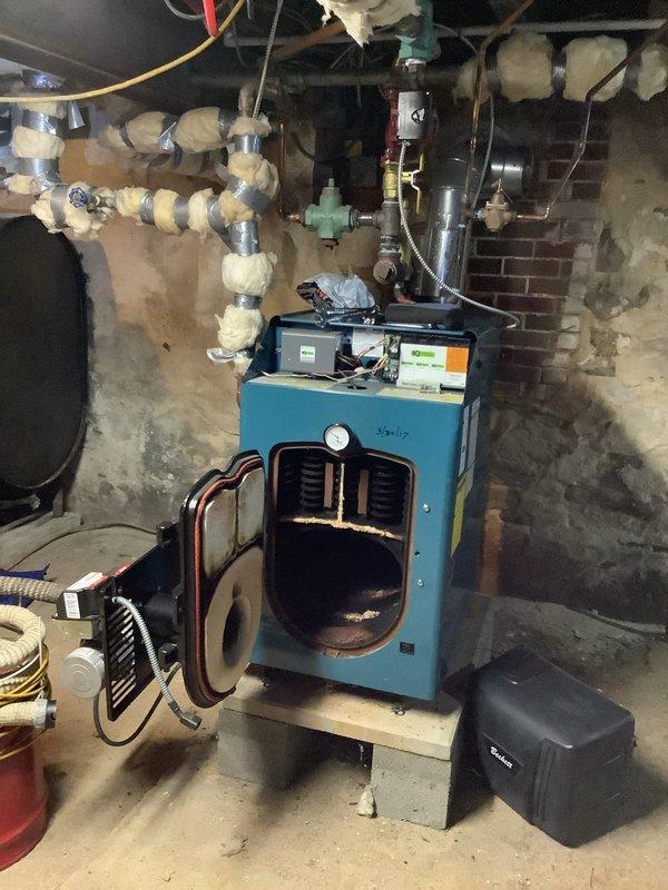 Performed comprehensive maintenance on 2017-era oil boiler system. Conducted water quality testing for pH and iron levels to ensure proper system chemistry. Inspected all components including pressure gauge, valves, and piping insulation, confirming system is operating within normal parameters. All maintenance completed per manufacturer specifications.