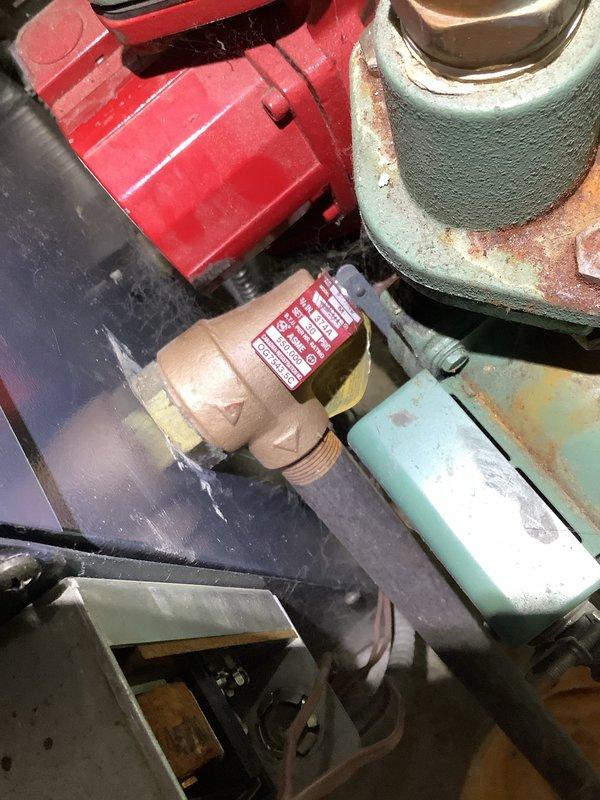 Diagnosed and replaced failed circulator pump on 40-year-old natural gas boiler system. Completed drain and refill procedure to restore heating functionality to basement zone, which had previously been non-operational. System showed significant mineral buildup and oxidation consistent with age, but is now operating properly after repair.