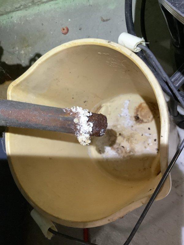 Diagnosed and replaced failed circulator pump on 40-year-old natural gas boiler system. Completed drain and refill procedure to restore heating functionality to basement zone, which had previously been non-operational. System showed significant mineral buildup and oxidation consistent with age, but is now operating properly after repair.