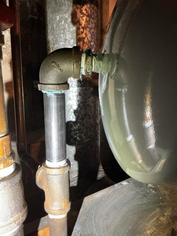 Returned to site to replace expansion tank and T&P valve as scheduled. Also replaced the boiler pressure reducing valve (PRV) to address system pressure regulation issues. All components successfully installed and system functioning properly.