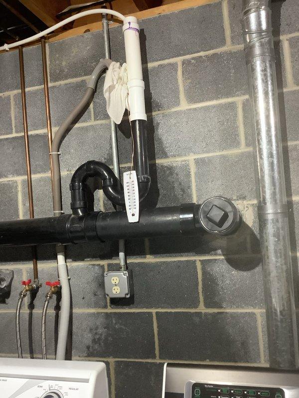 Responded to service call for a sewer line backup causing water to back up into basement when fixtures were in use. Investigated approximately 20-foot straight line between house and pit, which had been emptied approximately two weeks prior. Successfully cleared blockage and restored proper drainage function.