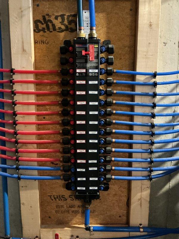 Disconnected and capped gas lines for kitchen range and dryer, and water lines for refrigerator and washing machine. Relocated washer and dryer to garage temporarily for flooring installation. Upon completion of flooring work, reinstalled all appliances, reconnected all utility lines, and installed new toilet in half bath.