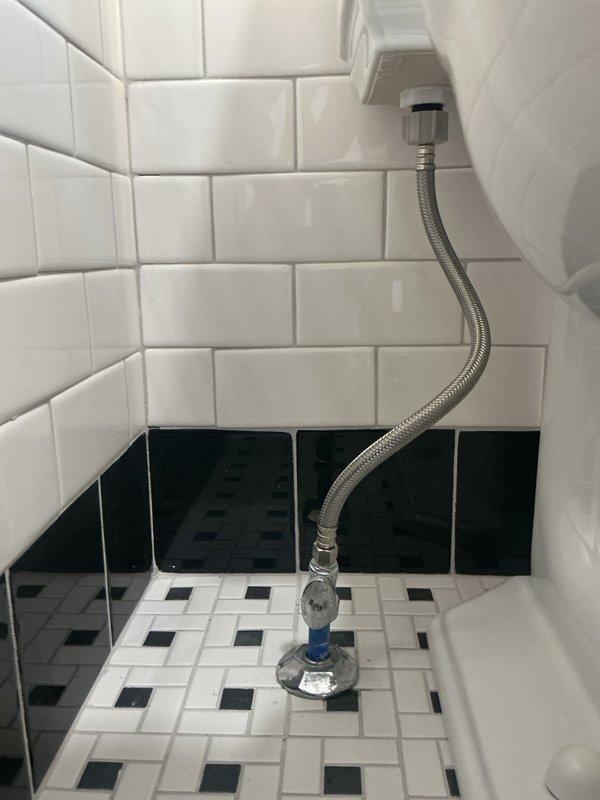 Completed second stage of bathroom remodel by installing and connecting the undermount sink with brushed brass widespread faucet to water supply, installing toilet with proper supply line connection, and finalizing shower installation by adding tub spout, trim plate and handle to previously installed shower valve. All fixtures were tested for proper function and water flow with no leaks observed.