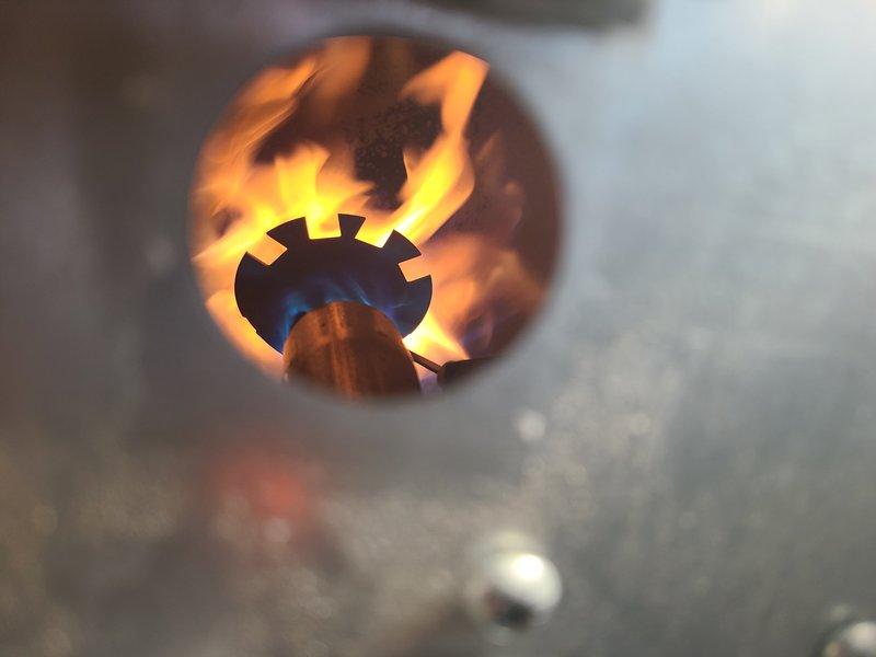 Responded to after-hours emergency call for heating system failure. Diagnosed faulty ignition electrode preventing proper flame ignition. Replaced ignition electrode and verified proper flame pattern and combustion in burner assembly, restoring system to normal operation.