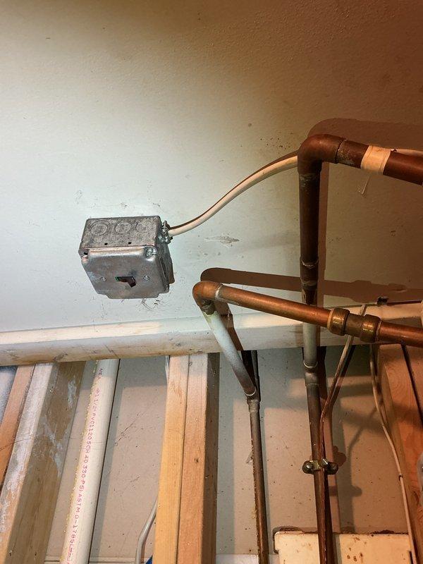 Inspected A.O. Smith Signature water heater reporting leakage at base. Performed visual examination of tank exterior and plumbing connections. Identified and repaired leak at copper pipe fitting junction where corrosion had developed, resolving the issue without need for tank replacement.