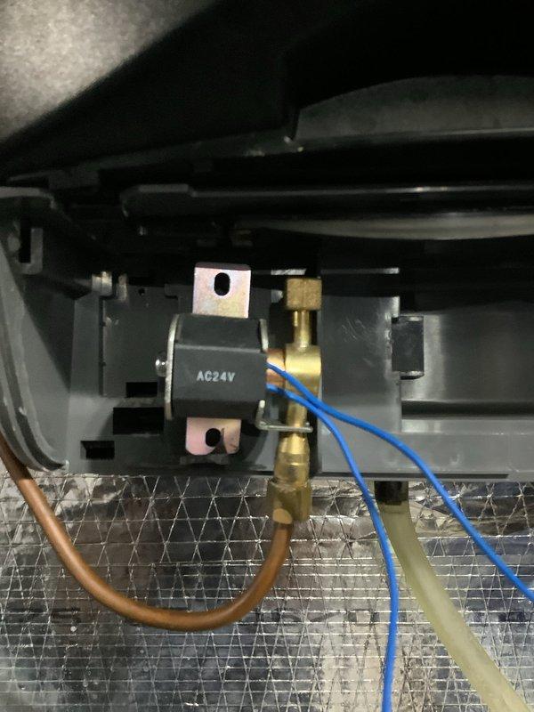 Responded to service call for humidifier leakage issue. Diagnosed faulty solenoid water valve, which was replaced to resolve the leak. Additionally installed a dedicated shut-off valve to the humidifier system for improved serviceability and leak prevention.