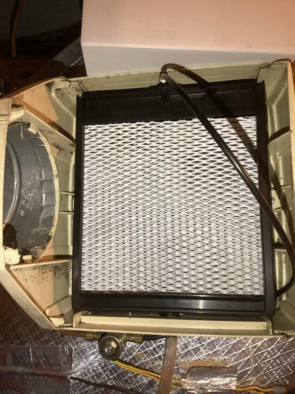 Completed CPM heating inspection on a 2017 Rheem heat pump system. Performed diagnostic testing with UEi meter, obtaining readings of 0.036. Inspected interior components including filter assembly and verified proper installation and condition of system components.