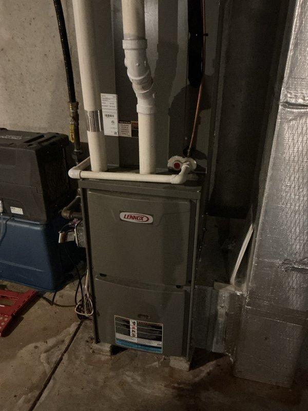 Responded to call for non-functioning propane heating system. Upon inspection of Lennox furnace, diagnosed ignition failure despite gas supply reaching the unit. Accessed internal components, checked wiring connections and circuit boards, then performed system reset and verified proper operation. Heating system now functioning correctly with normal ignition sequence and appropriate flame.