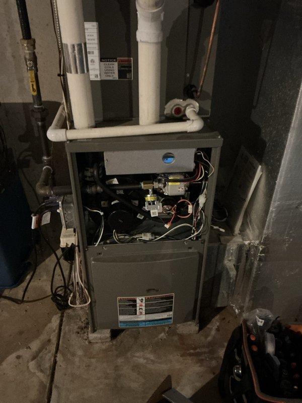 Responded to call for non-functioning propane heating system. Upon inspection of Lennox furnace, diagnosed ignition failure despite gas supply reaching the unit. Accessed internal components, checked wiring connections and circuit boards, then performed system reset and verified proper operation. Heating system now functioning correctly with normal ignition sequence and appropriate flame.