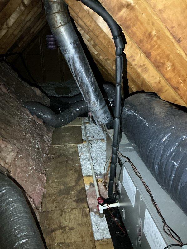 Performed annual maintenance on Lennox heat pump system installed in 2021. Inspected attic ductwork, checked connections, and examined insulated piping for proper operation. System is functioning within normal parameters; recommended continued regular maintenance to maintain efficiency and extend equipment lifespan.