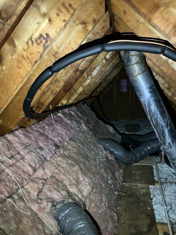 Performed annual maintenance on Lennox heat pump system installed in 2021. Inspected attic ductwork, checked connections, and examined insulated piping for proper operation. System is functioning within normal parameters; recommended continued regular maintenance to maintain efficiency and extend equipment lifespan.