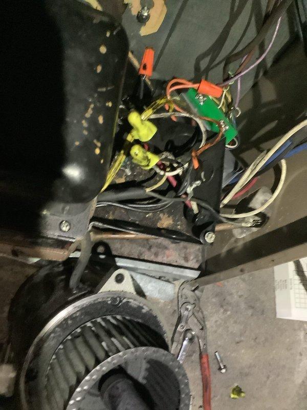 # After Hours Emergency Service Report

Responded to emergency no-heat call. Upon arrival, inspected furnace and found system inoperative. Accessed blower compartment and control section to diagnose issue. Examined electrical connections, gas valve assembly, and ignition control module. Located failed ignition control board preventing system operation. Tested gas valve functionality and verified proper voltage supply to components. Identified corroded base plate and accumulated debris within unit affecting performance. Cleaned accessible areas of blower wheel showing dust accumulation. Checked all wire connections including bundled field wiring with proper terminations. Replaced defective ignition control module and verified all electrical connections were secure. Cycled system through multiple heating cycles to confirm proper ignition sequence and burner operation. Verified blower motor engagement and airflow. System restored to full operational status. Advised customer of observed co