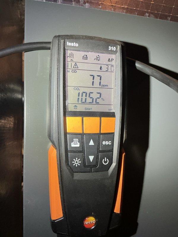 Responded to no heat call on Rheem oil-fired heating system installed in 2018. Customer reported loss of power while away, resulting in flame error and system lockout upon return. Performed system diagnostics and combustion analysis using Testo 310 analyzer, confirming CO levels at 77 ppm and combustion efficiency at 105.2%. Inspected burner assembly, air band settings, and primary control mechanism. Reset system, adjusted air-to-fuel ratio as needed, and restored heat to residence.