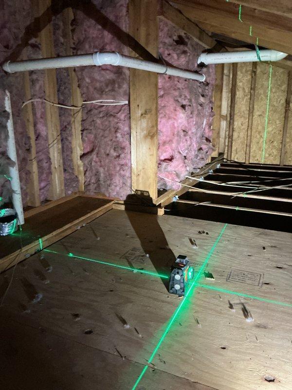 Rerouted dryer vent from improper termination in garage crawlspace to proper exterior exhaust. Installed rigid ductwork through attic space with appropriate support and sealed all connections to ensure code-compliant ventilation and prevent moisture buildup in enclosed areas.