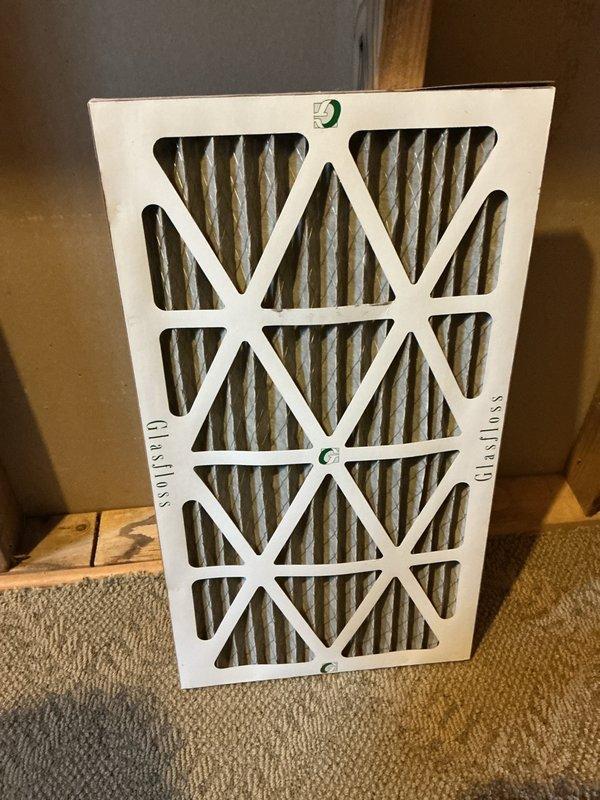 Performed pre-rental inspection of natural gas furnace and air conditioning system at residential property. Found heavily deteriorated electrical component with cracked bakelite housing, exposed internal connections, and significant material breakdown posing safety concerns. Inspected HVAC air filter showing dust accumulation and normal wear. Discussed system operational status and recommended necessary repairs to electrical components before occupancy, and presented available preventative maintenance program options to ensure continued safe operation of heating and cooling equipment.