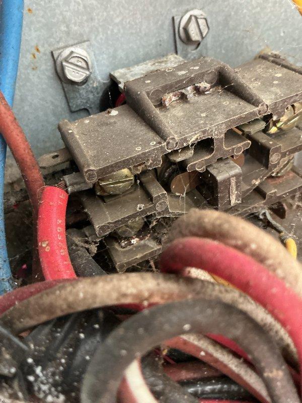 Performed pre-rental inspection of natural gas furnace and air conditioning system at residential property. Found heavily deteriorated electrical component with cracked bakelite housing, exposed internal connections, and significant material breakdown posing safety concerns. Inspected HVAC air filter showing dust accumulation and normal wear. Discussed system operational status and recommended necessary repairs to electrical components before occupancy, and presented available preventative maintenance program options to ensure continued safe operation of heating and cooling equipment.