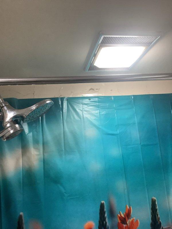 Responded to service call for shower leak penetrating through ceiling. Upon inspection, identified active water intrusion occurring around perimeter of existing ceiling opening during shower use. Replaced two faucets as scheduled and completed comprehensive plumbing system inspection of property. Documented HVAC system installation and bathroom fixture conditions with photographs for service records.