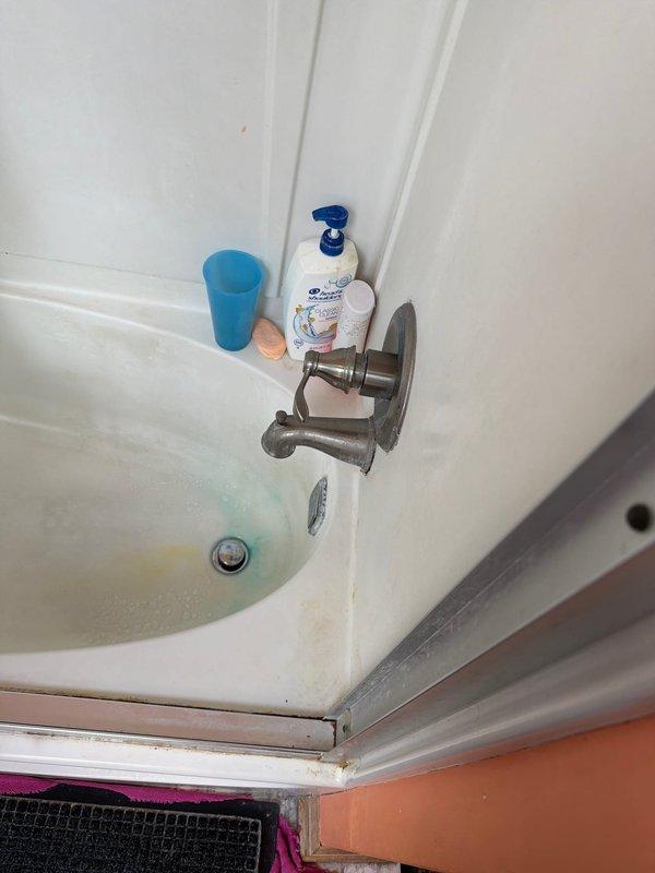Responded to dispatch for leaking Delta shower spigot that continued dripping when water was turned off. Upon inspection, identified worn internal cartridge causing the leak and replaced the faulty component, restoring proper shut-off function to the shower valve.