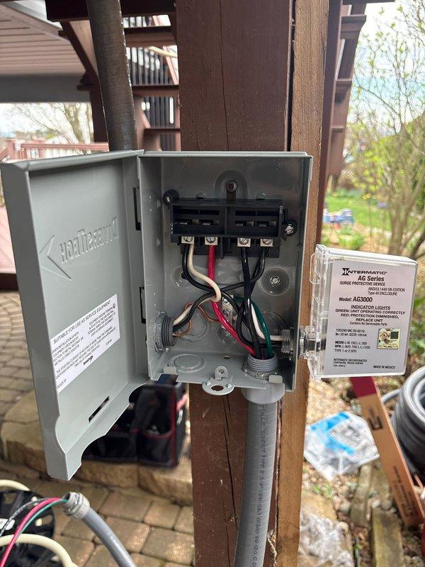 Completed installation of Daikin Aurora ductless heat pump system for sunroom application. Mounted indoor air handler unit on interior wall, installed outdoor disconnect box with proper electrical connections, and commissioned system for operation.