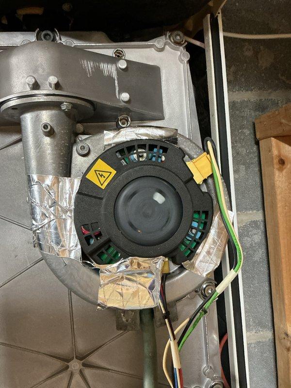 Responded to no hot water complaint on Triangle Tube Challenger CC125 propane-fired water heater installed in 2016. Upon arrival, found unit displaying error code 8E on control panel, indicating a flame sensing or ignition system fault. Inspected blower motor assembly, verified proper operation and electrical connections. Examined gas valve, pressure regulator, and supply lines for proper function. Checked flame sensor for carbon buildup and contamination. Verified all safety interlocks, pressure switches, and limit controls. Cleared error code, cycled unit through complete heating sequence, and confirmed restoration of hot water production with proper flame signal and combustion operation.